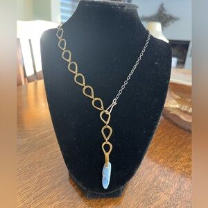 Handmade Sterling and brass 18” necklace with natural kyanite 1 1/4” stone.